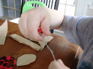 Fold both sides of wire down, and twist wire.  (Easiest if you hold wire while twisting the bead!)