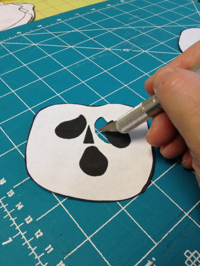 Cut out facial features.