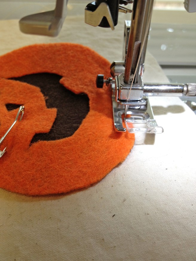 Sew around perimeter of ORANGE pumpkins, staying close to the edge--about an eighth of an inch.